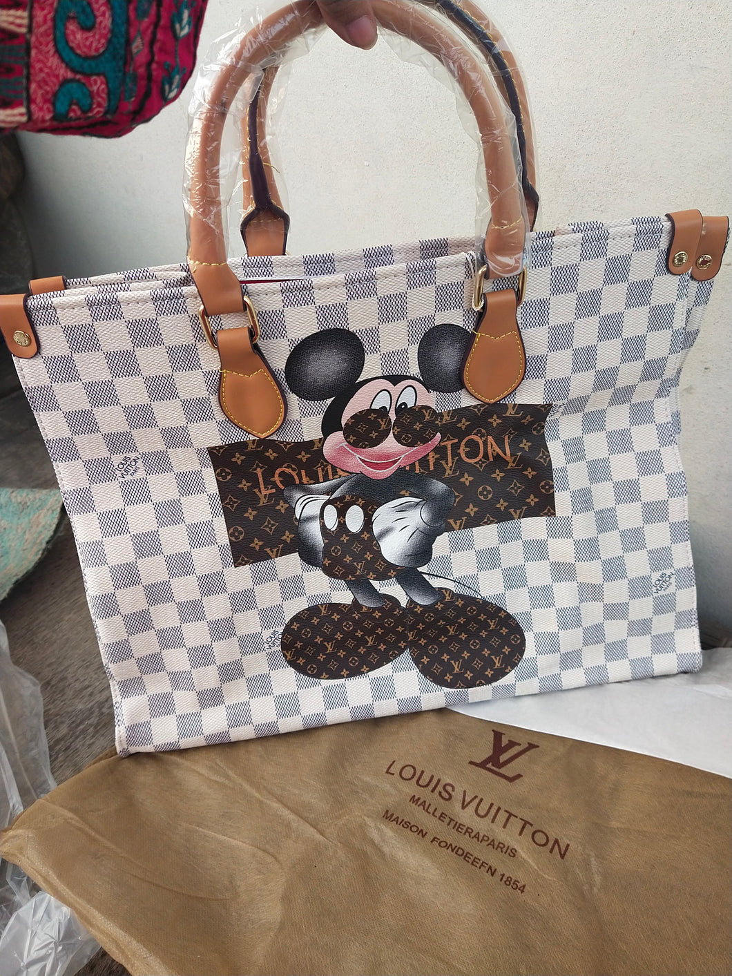 LV On the go Mickey Mouse shoulder bag